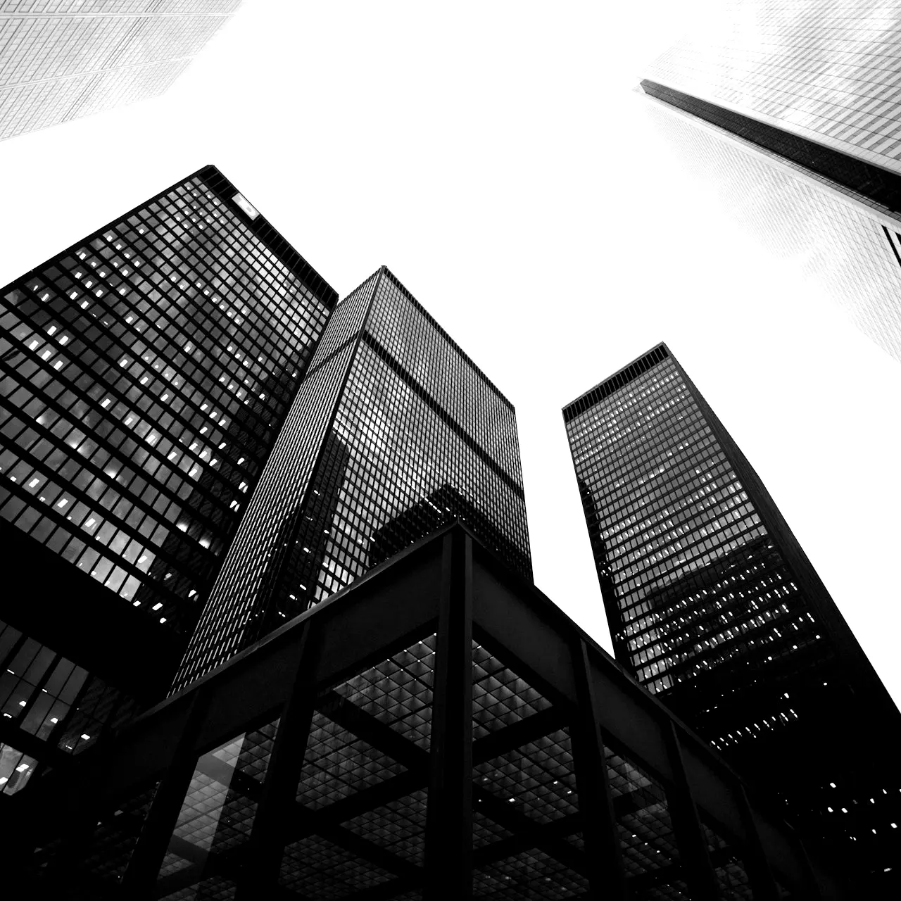 low angle photo of city high rise buildings during daytime