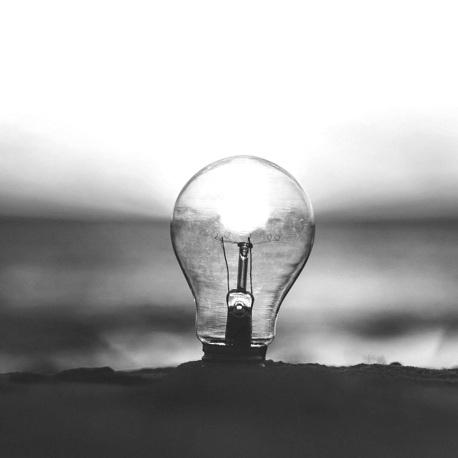 selective focus photography of light bulb