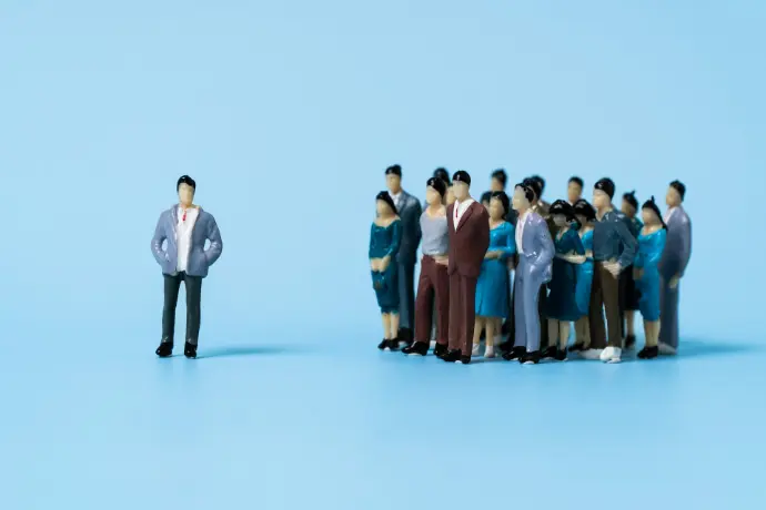 a group of people standing in a line